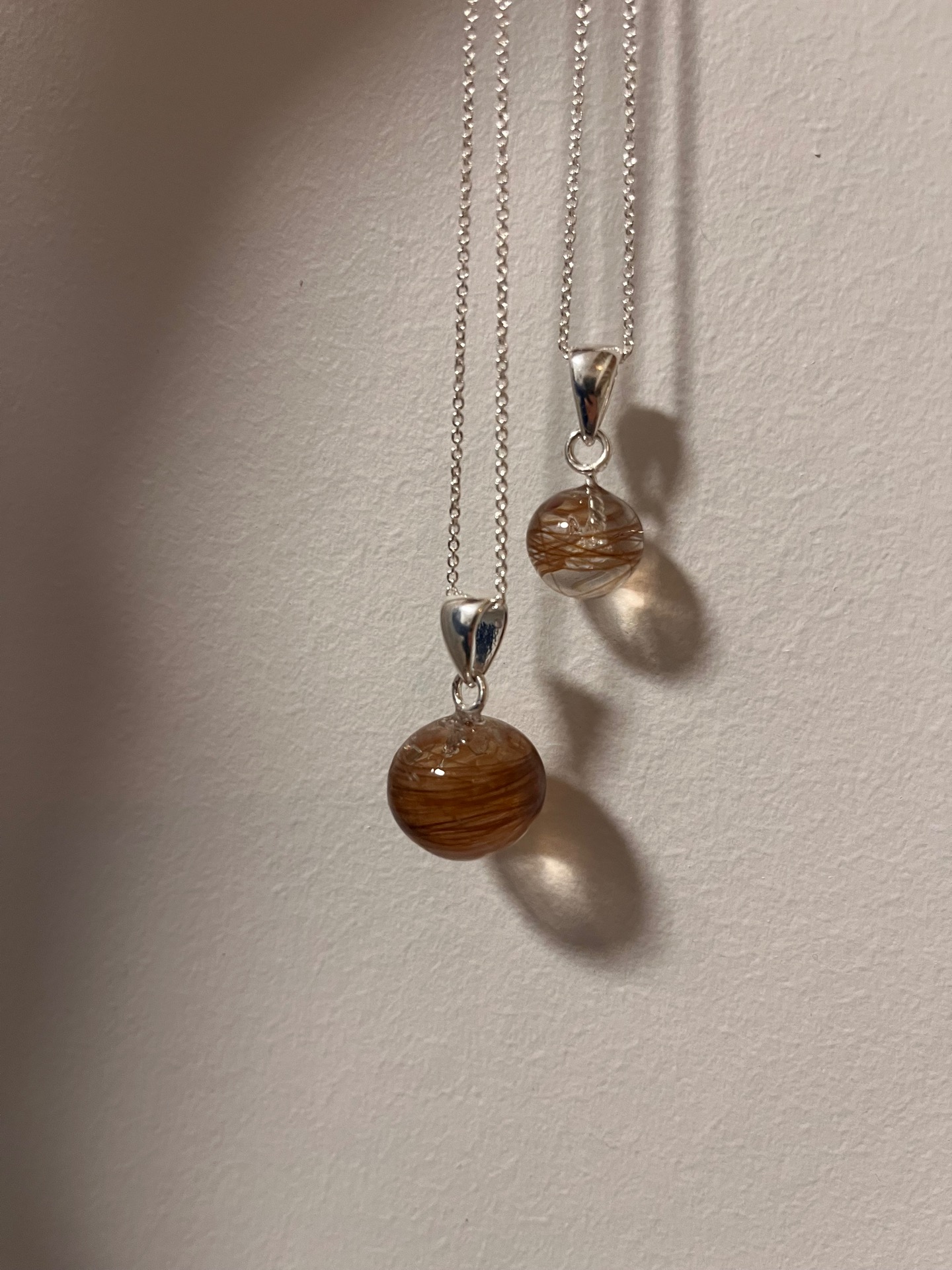 Stor og liten kule med dråpe oppheng